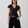 Kort peplum-top i blonder og voile