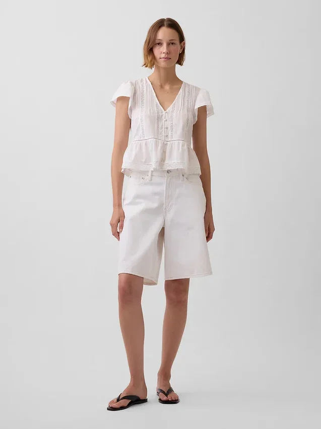 Kort peplum-top i blonder og voile