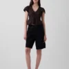 Kort peplum-top i blonder og voile