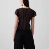 Kort peplum-top i blonder og voile