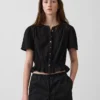 Kort peplum-top i bomullsgasbind