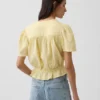 Kort peplum-top i bomullsgasbind