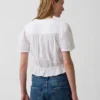Kort peplum-top i bomullsgasbind