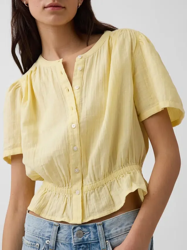 Kort peplum-top i bomullsgasbind