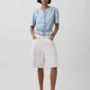 Kort peplum-top i denim