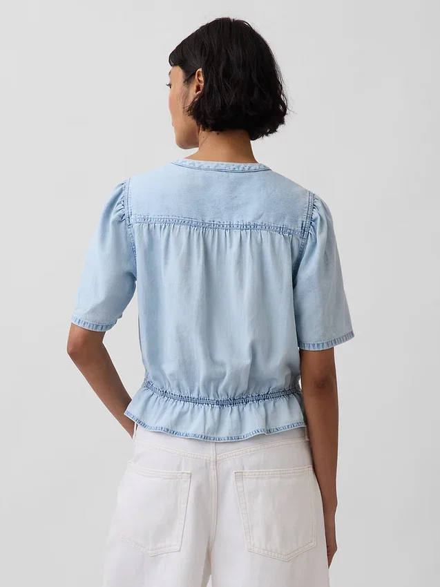 Kort peplum-top i denim