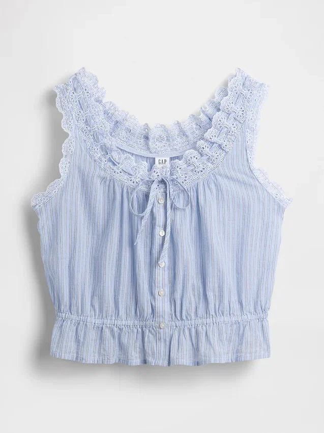 Kort peplum-top med bånd i fronten og hullkant