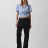 Kort peplum-top med knapper foran