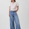 Kort peplum-top med knapper foran