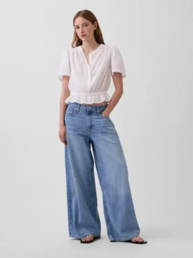 Kort peplum-top med knapper foran