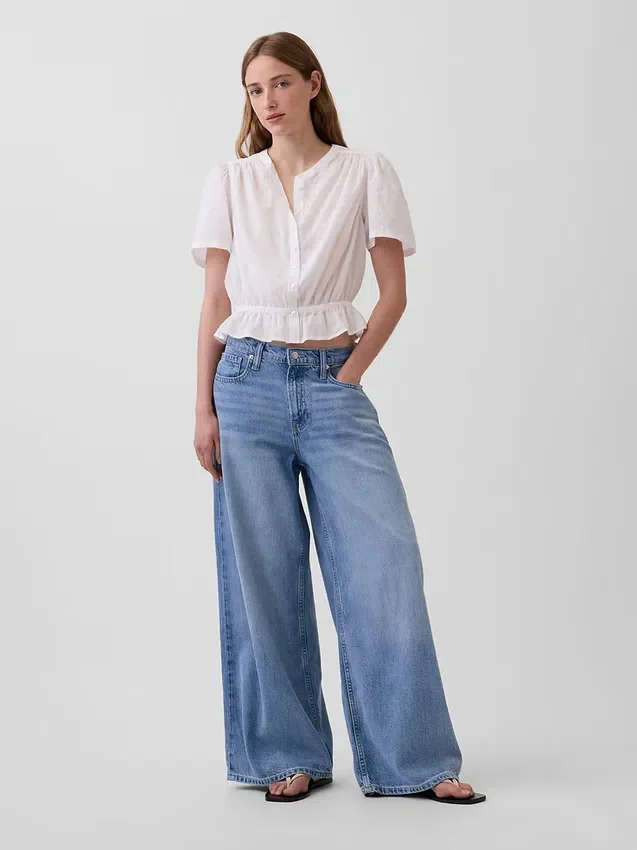 Kort peplum-top med knapper foran