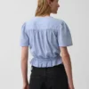 Kort peplum-top med knapper foran