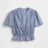 Kort peplum-top med knapper foran