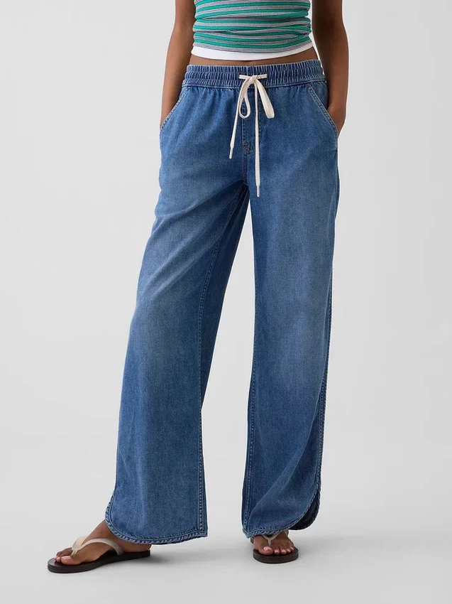 Lavt liv, ultramyke, løse 90-tallsjeans med «dolphin-hem»