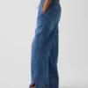 Lavt liv, ultramyke, løse 90-tallsjeans med «dolphin-hem»