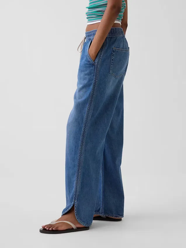 Lavt liv, ultramyke, løse 90-tallsjeans med «dolphin-hem»