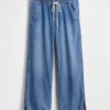 Lavt liv, ultramyke, løse 90-tallsjeans med «dolphin-hem»