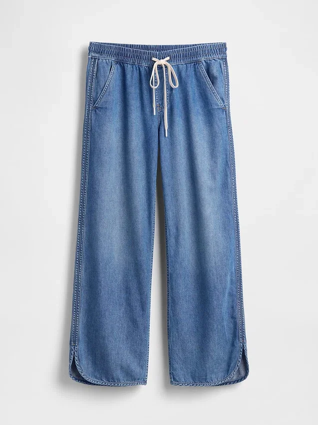 Lavt liv, ultramyke, løse 90-tallsjeans med «dolphin-hem»