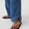Lavt liv, ultramyke, løse 90-tallsjeans med «dolphin-hem»