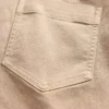 Lavt sittende, lange og slanke bukser i twill