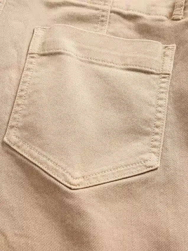 Lavt sittende, lange og slanke bukser i twill