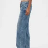 Løse jeans med lav midje og snøring i 90-tallsstil