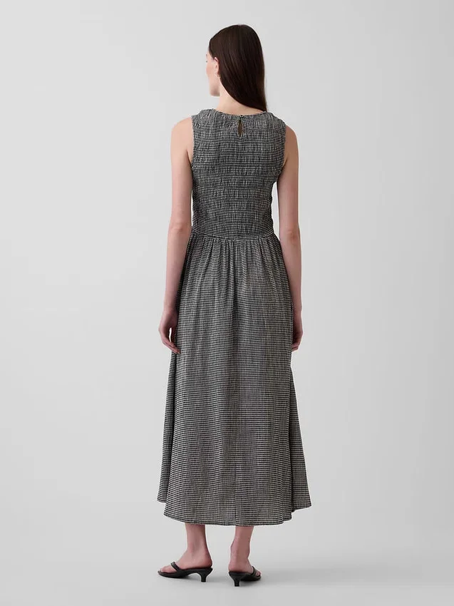 Maxikjole i gingham med smock og lav midje