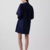 Mini-kjole i poplin med Henley-hals