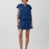 Mini-skort i bomullsgasdenim med smocket midje