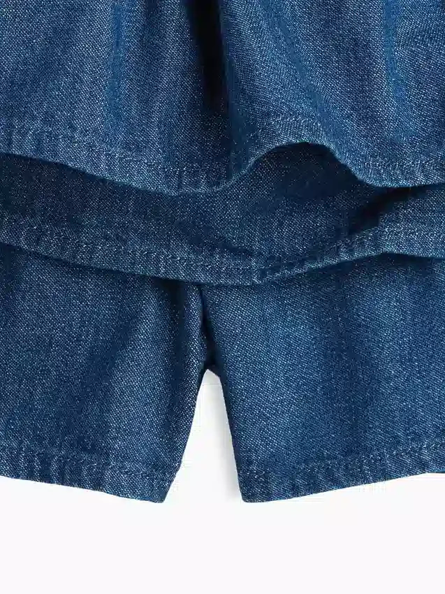 Mini-skort i denim med smocking for barn