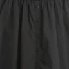 Moderne maxi-kjole i blandede materialer