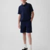 Moderne uniform-shorts for barn i khaki
