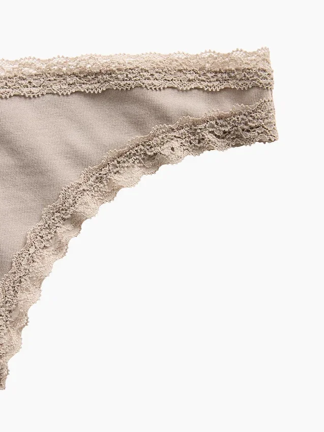 Mykeste økologisk stretchbomull-string med blonder