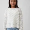 Oversized genser med rund hals i heklet bomull for barn