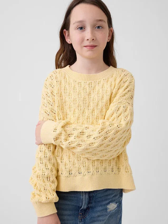Oversized genser med rund hals i heklet bomull for barn