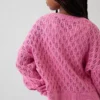 Oversized genser med rund hals i heklet bomull for barn