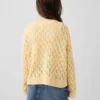 Oversized genser med rund hals i heklet bomull for barn