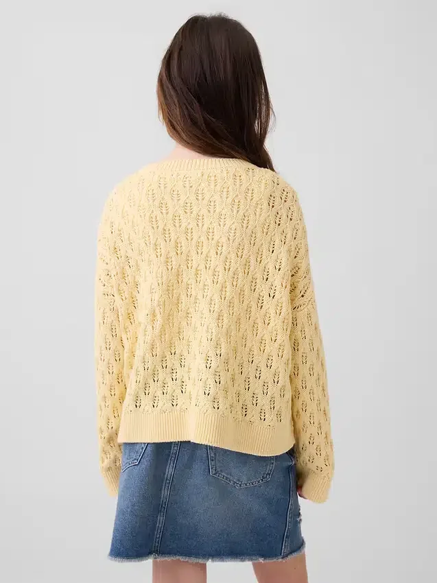 Oversized genser med rund hals i heklet bomull for barn