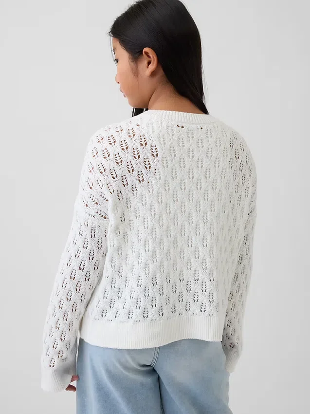 Oversized genser med rund hals i heklet bomull for barn