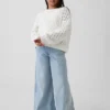 Oversized genser med rund hals i heklet bomull for barn