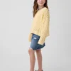 Oversized genser med rund hals i heklet bomull for barn