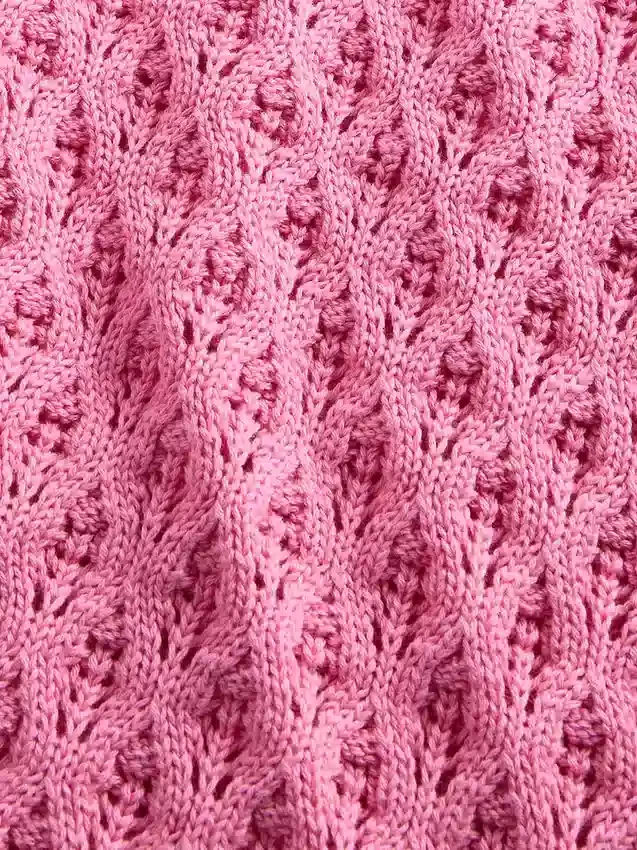 Oversized genser med rund hals i heklet bomull for barn