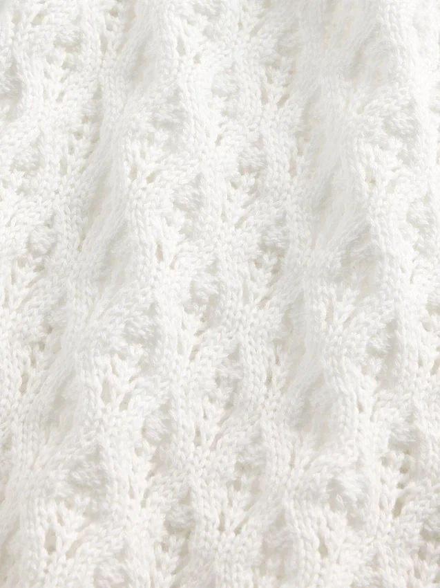Oversized genser med rund hals i heklet bomull for barn