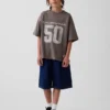 Oversized grafisk jersey-T-skjorte i mesh for barn