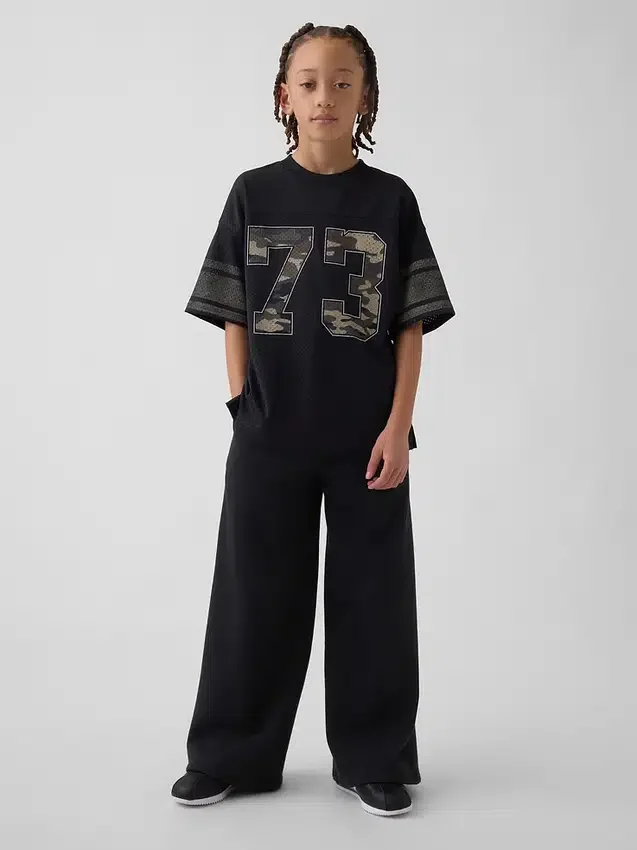 Oversized grafisk jersey-T-skjorte i mesh for barn