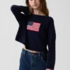 Oversized heklet genser for barn med amerikansk motiv