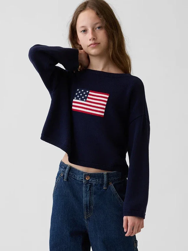 Oversized heklet genser for barn med amerikansk motiv