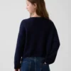 Oversized heklet genser for barn med amerikansk motiv