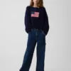 Oversized heklet genser for barn med amerikansk motiv