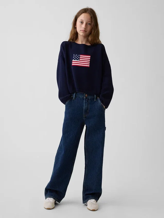 Oversized heklet genser for barn med amerikansk motiv